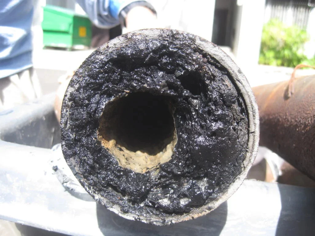 Drain cleaning technician working